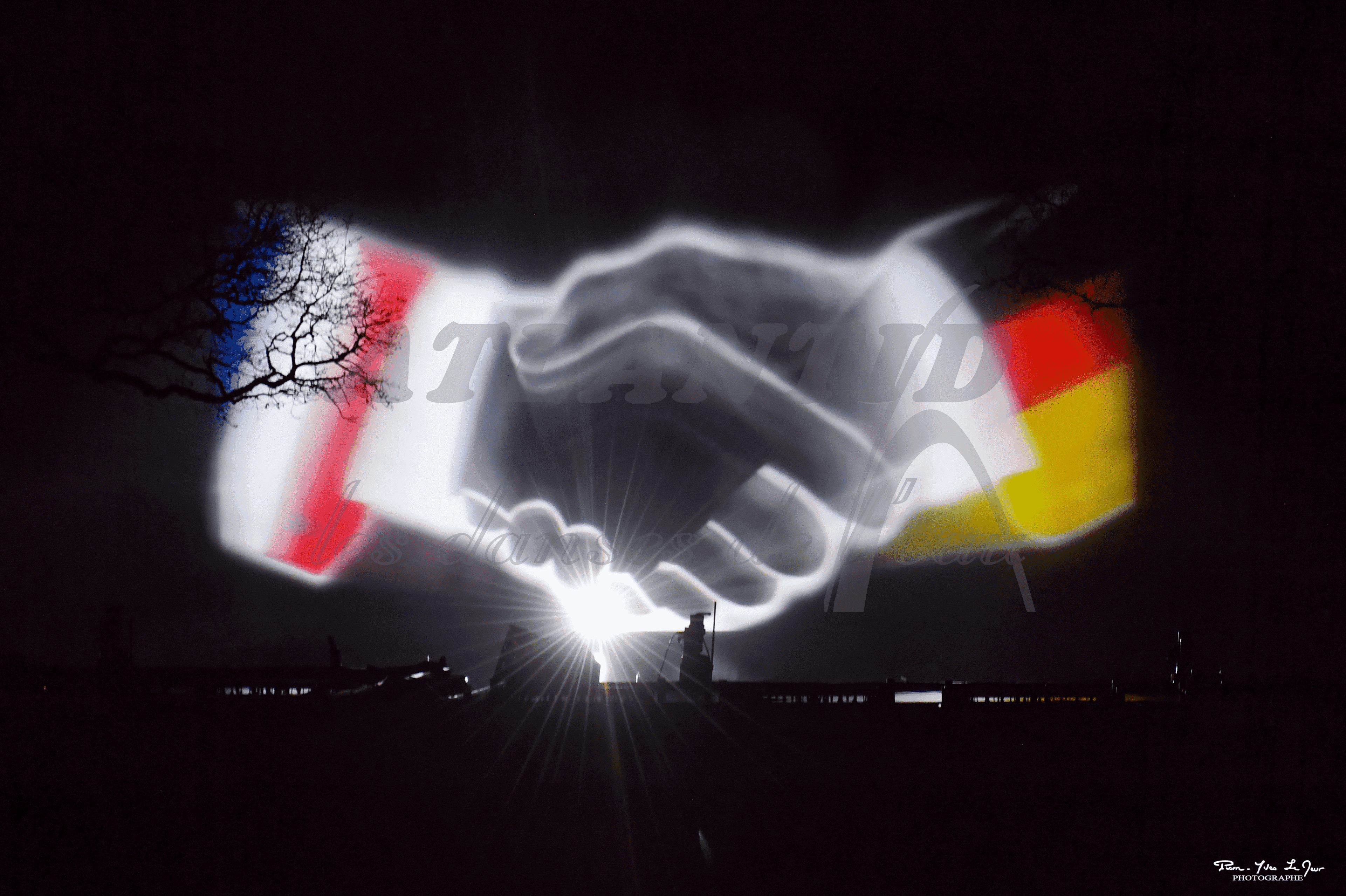 Atlantid - Projection of a French hand and a German hand shaking on water - Commemoration 1944